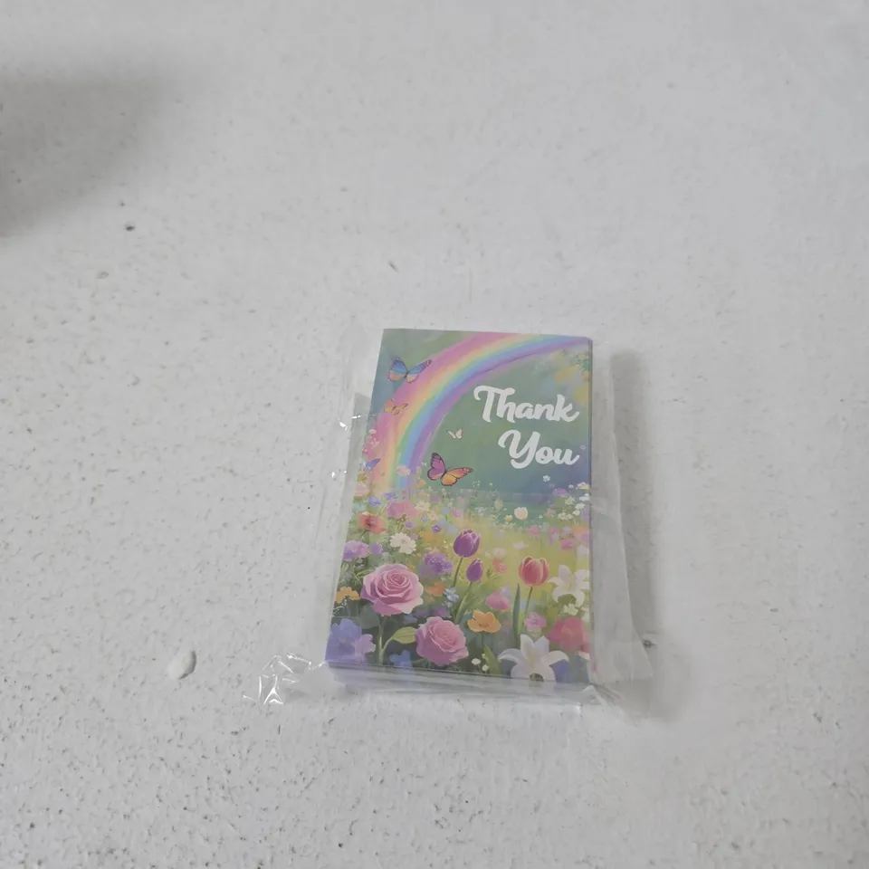 APPROXIMATELY 10 ASSORTED ITEMS INCLUDING JUMBO FABRIC PLASTERS AND THANK YOU CARDS 