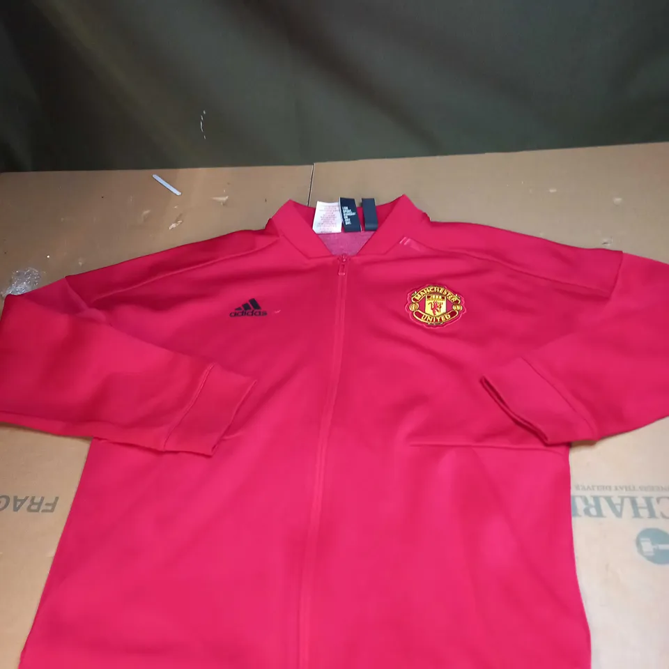 MANCHESTER UNITED TRAINING JACKET SIZE 11-12 YEARS