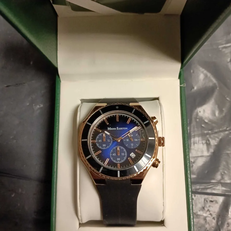 MANN EGERTON CHRONOGRAPH WATCH – BLUE DIAL, ROSE GOLD CASE, BLACK STRAP (BOXED)