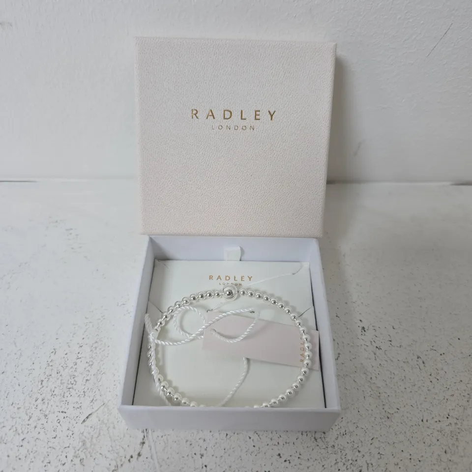BOXED RADLEY SILVER PLATED BEAD HINGED BANGLE