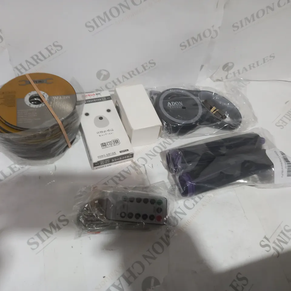 TOTE OF APPROXIMATELY 16 ASSORTED ITEMS TO INCLUDE A DOG LEAD, PLAIN CD SET AND A REMOTE