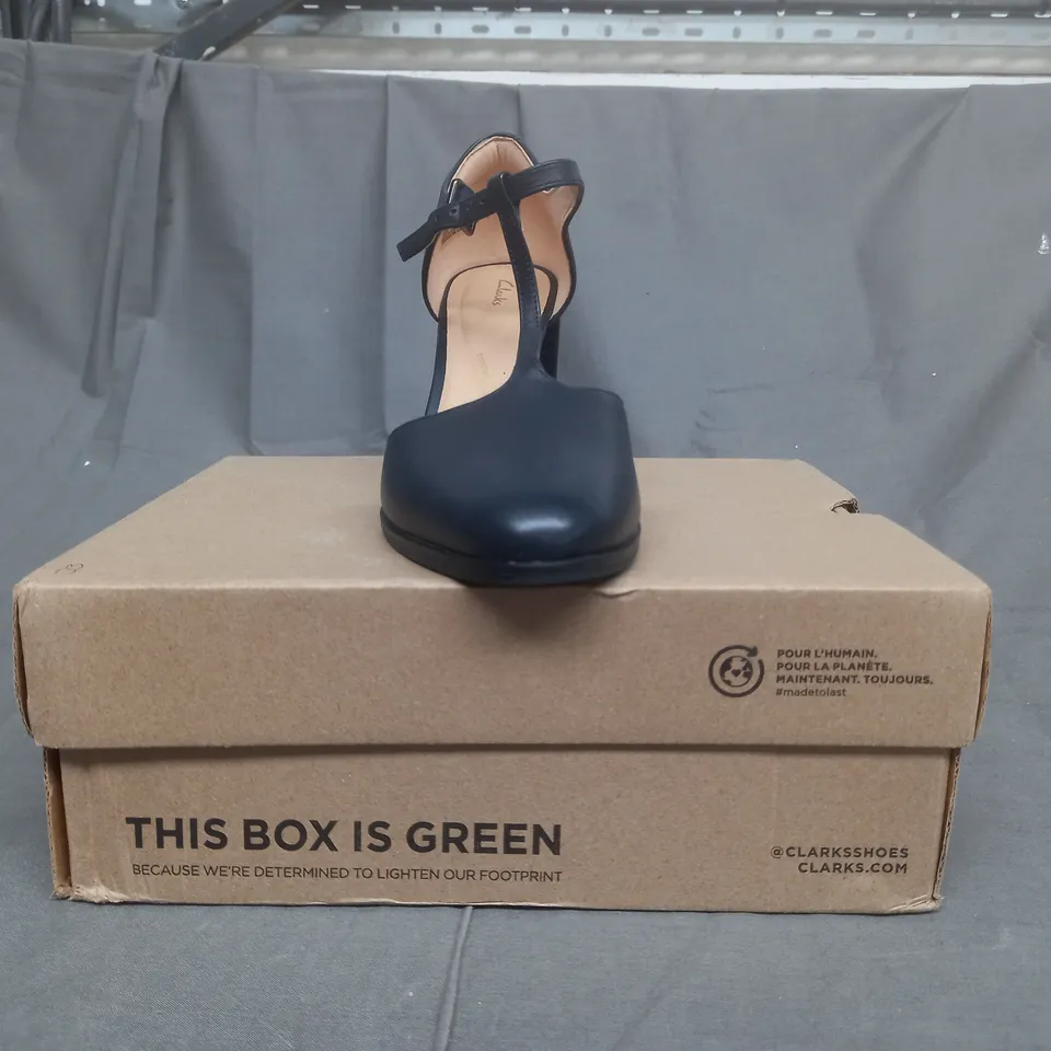 BOXED PAIR OF CLARKS HEELS IN NAVY UK SIZE 6