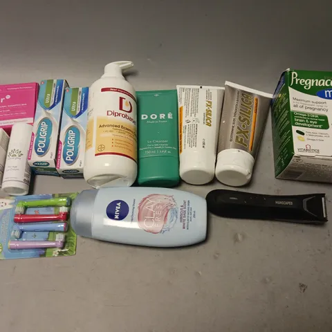 BOX OF APPROXIMATELY 15 COSMETIC ITEMS TO INCLUDE - FX SOOTHING GEL, MANSCAPED RAZOR, AND POLIGRIP ULTRA ETC.