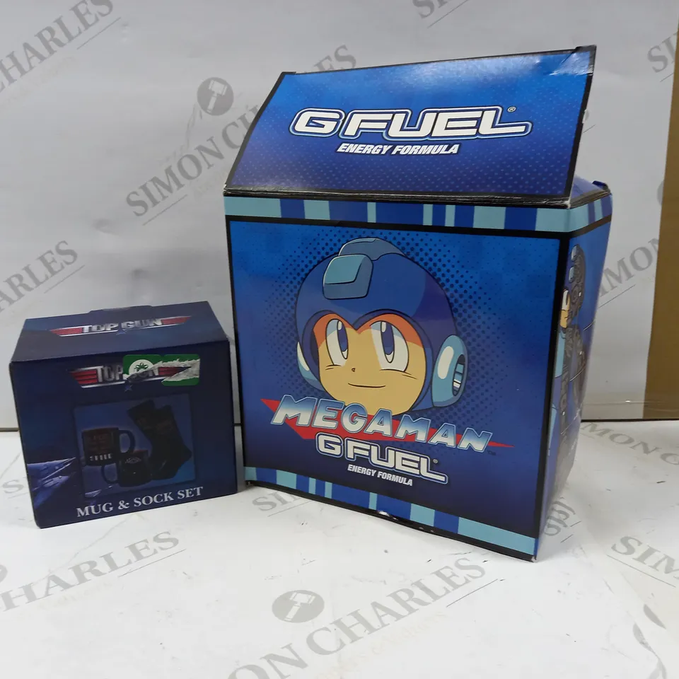4 ASSORTED PRODUCTS TO INCLUDE; SOLDIER SKITTLES, MEGAMAN G FUEL FLASKS AND TOP GUN MUG AND SOCK SET