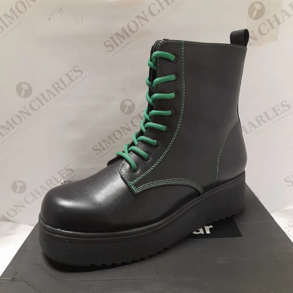 KOI THRAX BLACL PU/GREEN LACE UP CLASS BOOTS - SIZE 7