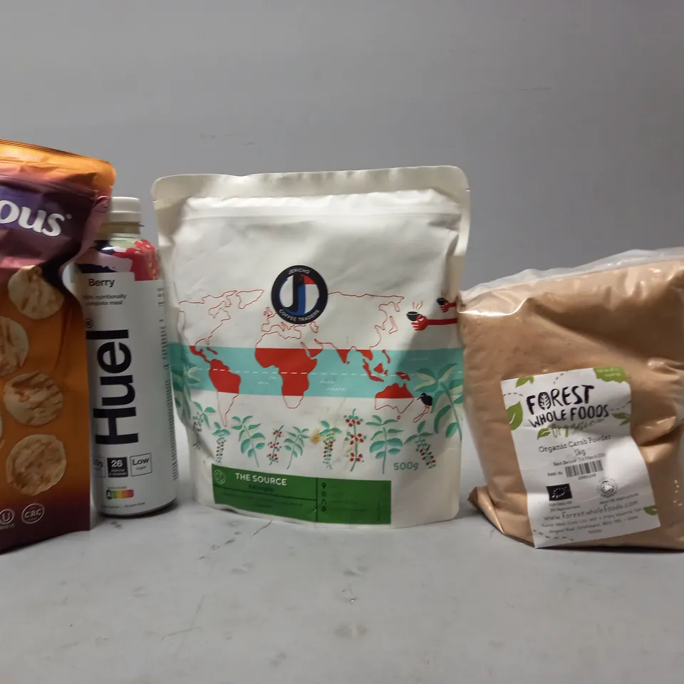 TOTE OF APPROX 11 ASSORTED FOOD ITEMS TO INCLUDE -  HUEL BANANA , DRIZZILICIOUS SALTED CARAMEL BITES , HUEL BERRY ETC