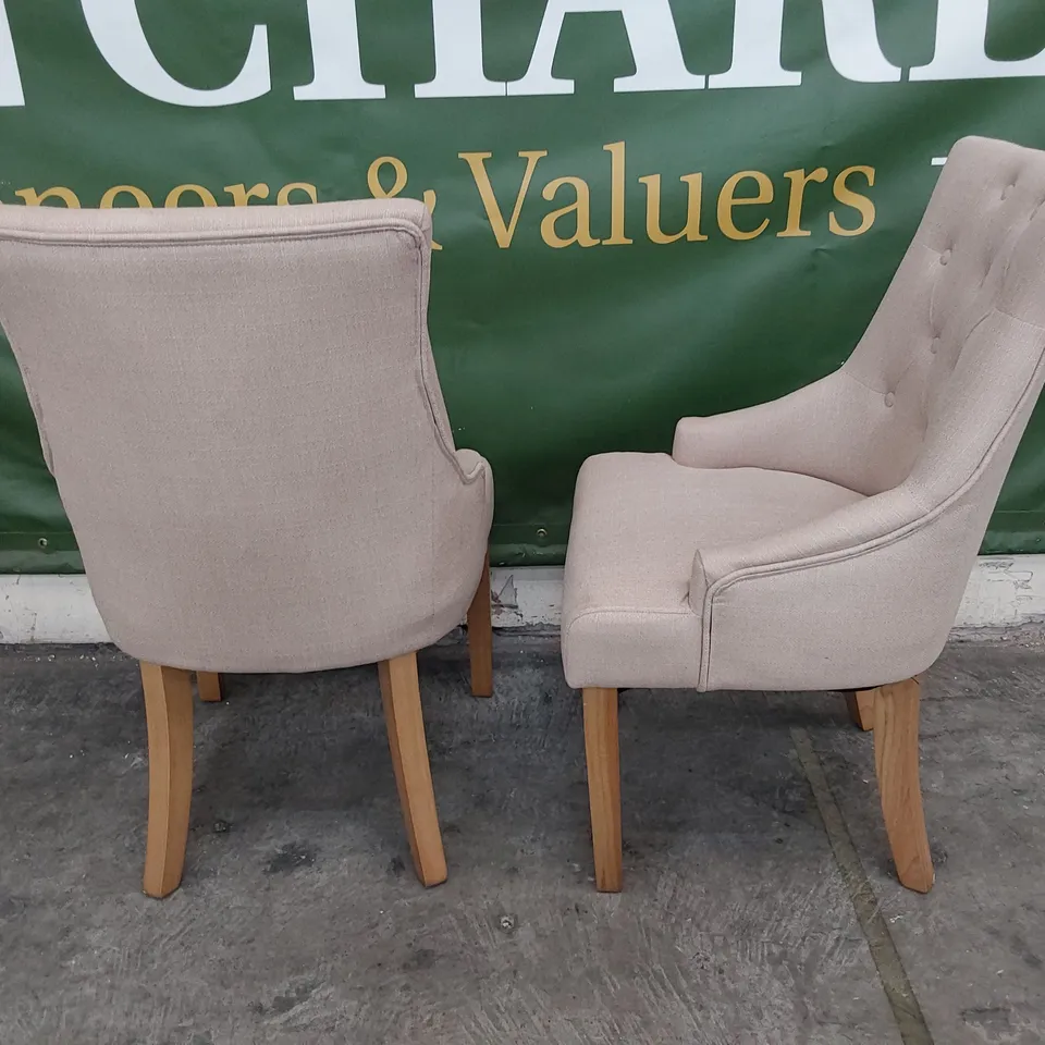 PAIR OF UPHOLSTERED BUTTONED BACK DINING CHAIRS NATURAL FABRIC ON NATURAL WOOD LEGS 