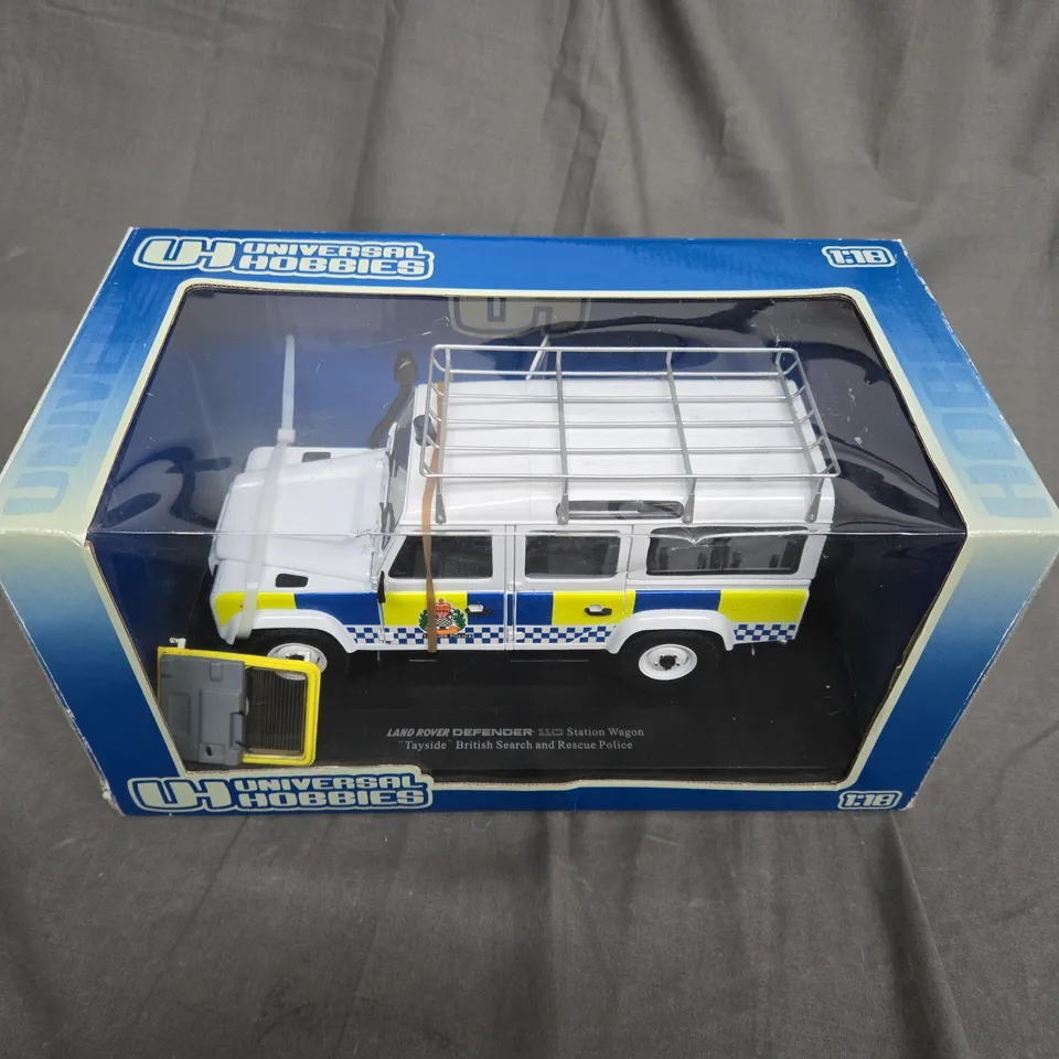 UNIVERSAL HOBBIES - LAND ROVER DEFENDER - 110 STATION WAGON - BRITISH SEARCH AND RECUE POLICE