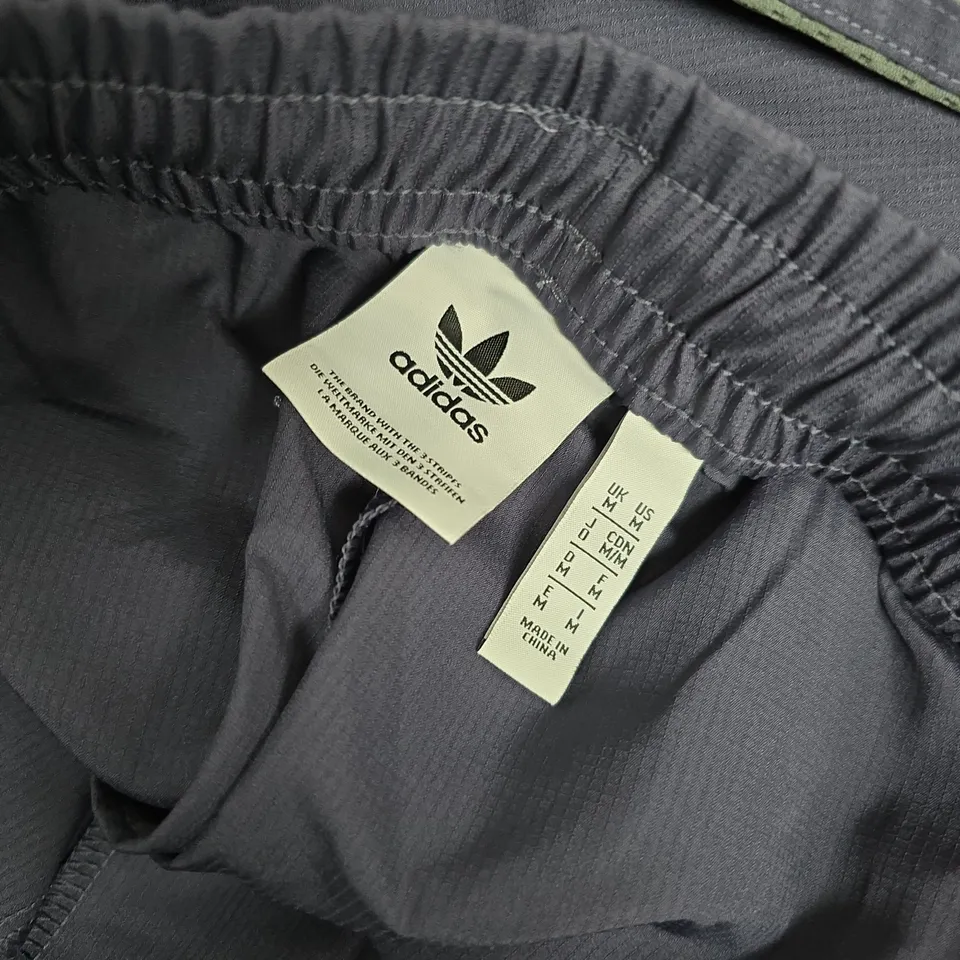 ADIDAS TRACK PANTS – PURPLE WITH GREEN SIDE STRIPES, MEN'S SIZE M