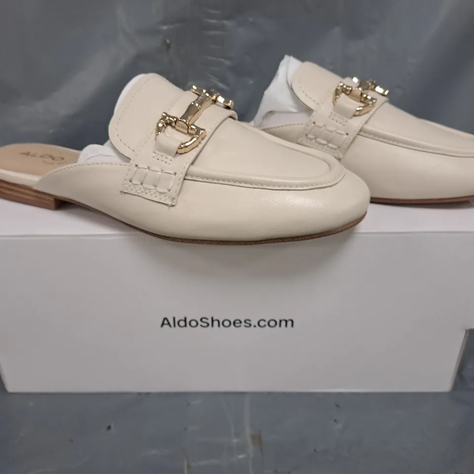 BOXED PAIR OF ALDO OPEN BACK SLIP-ON LOAFERS IN CREAM W. GOLD EFFECT DETAIL SIZE UK 4