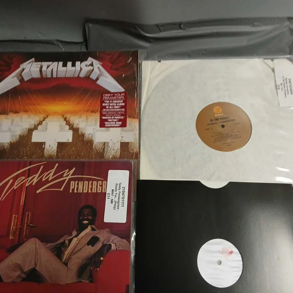 LOT OF 9 ASSORTED VINYLS TO INCLUDE METALLICA, ROGER WATERS AND BANNED BALLADS