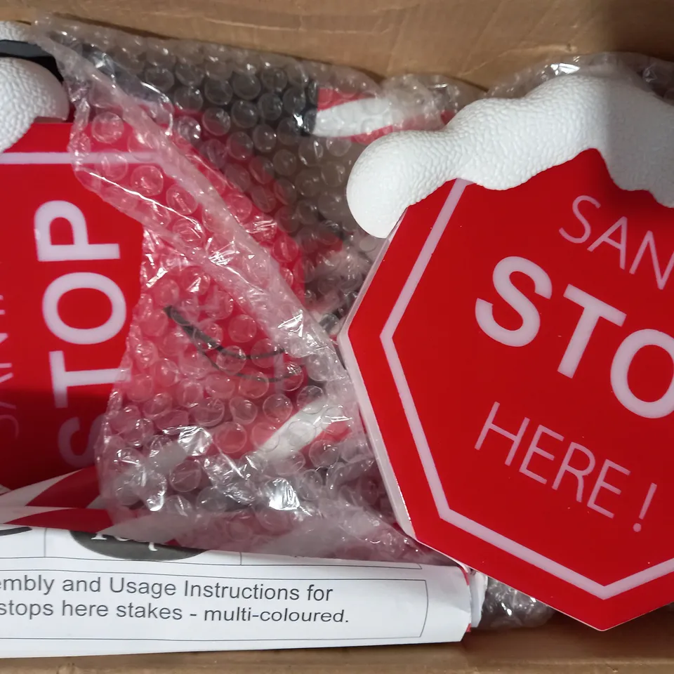 BOXED FESTIVE SET OF PRELIT SANTA STOP HERE STAKES