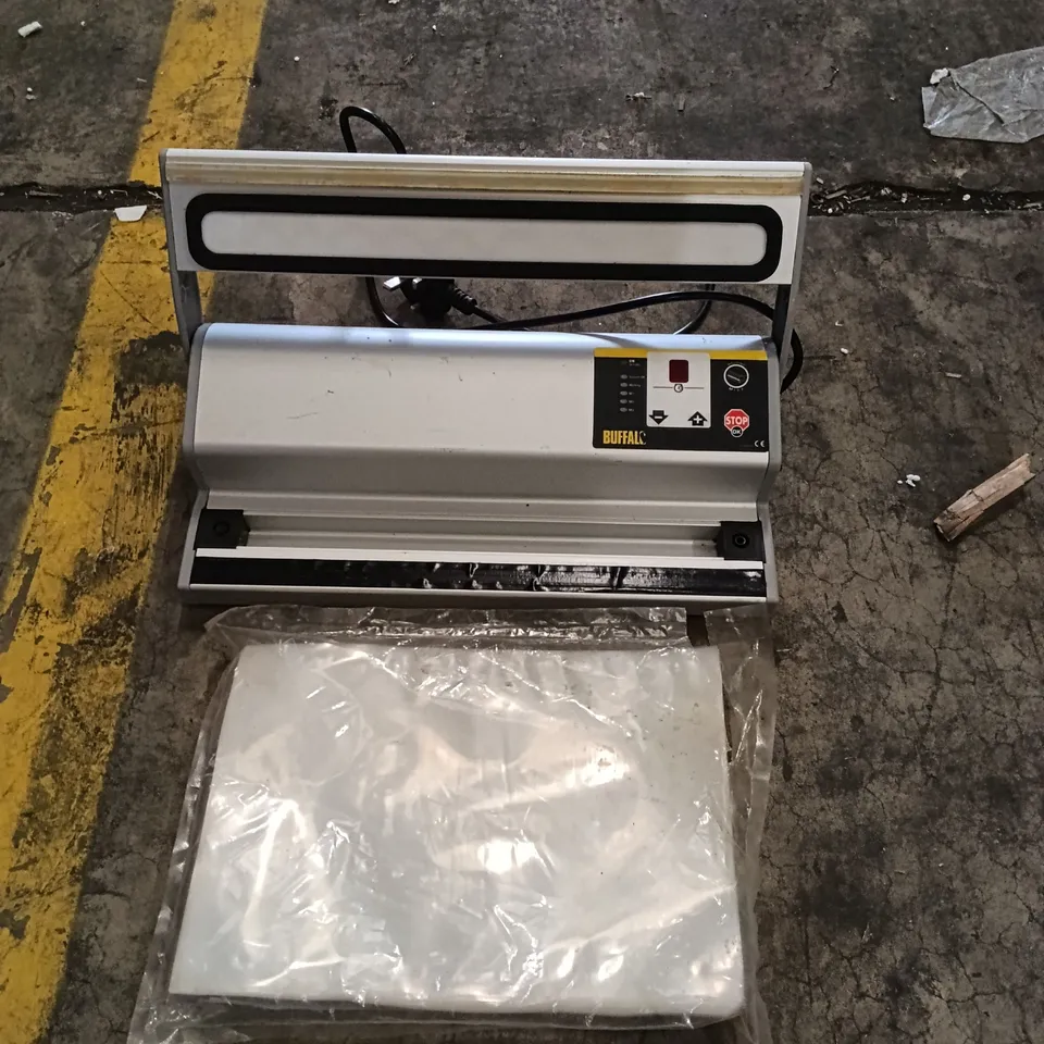 BUFFALO VACUUM PACKING MACHINE 300MM WITH VACCUM BAGS