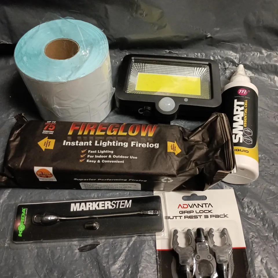 APPROXIMATELY 15 ASSORTED HOUSEHOLD ITEMS TO INCLUDE FIRE LOG, LED LIGHT, LABELS ETC 