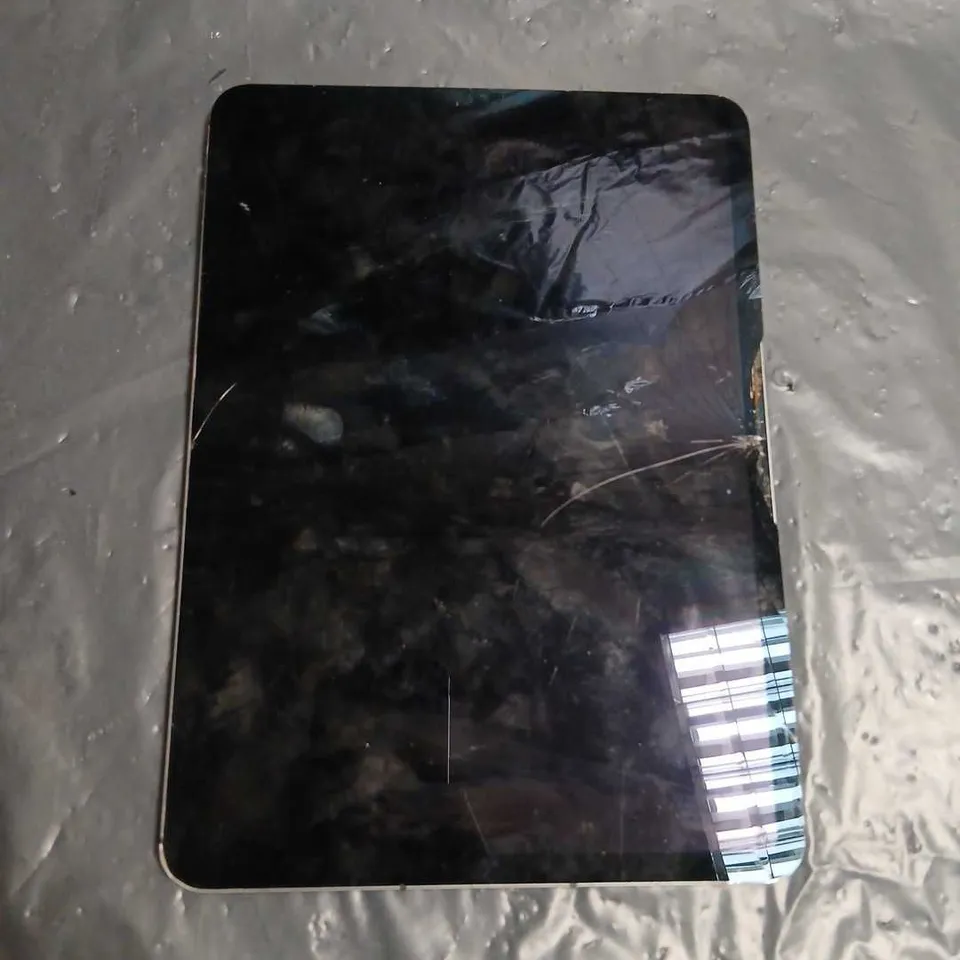APPLE IPAD A2459– DAMAGED/DISMANTLED TABLET (FRONT AND BACK VIEWS)