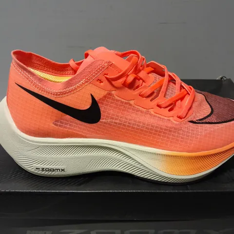 BOXED PAIR OF NIKE WOMENS ZOOMX VAPORFLY NEXT% TRAINERS IN ORANGE/WHITE - UK 5.5