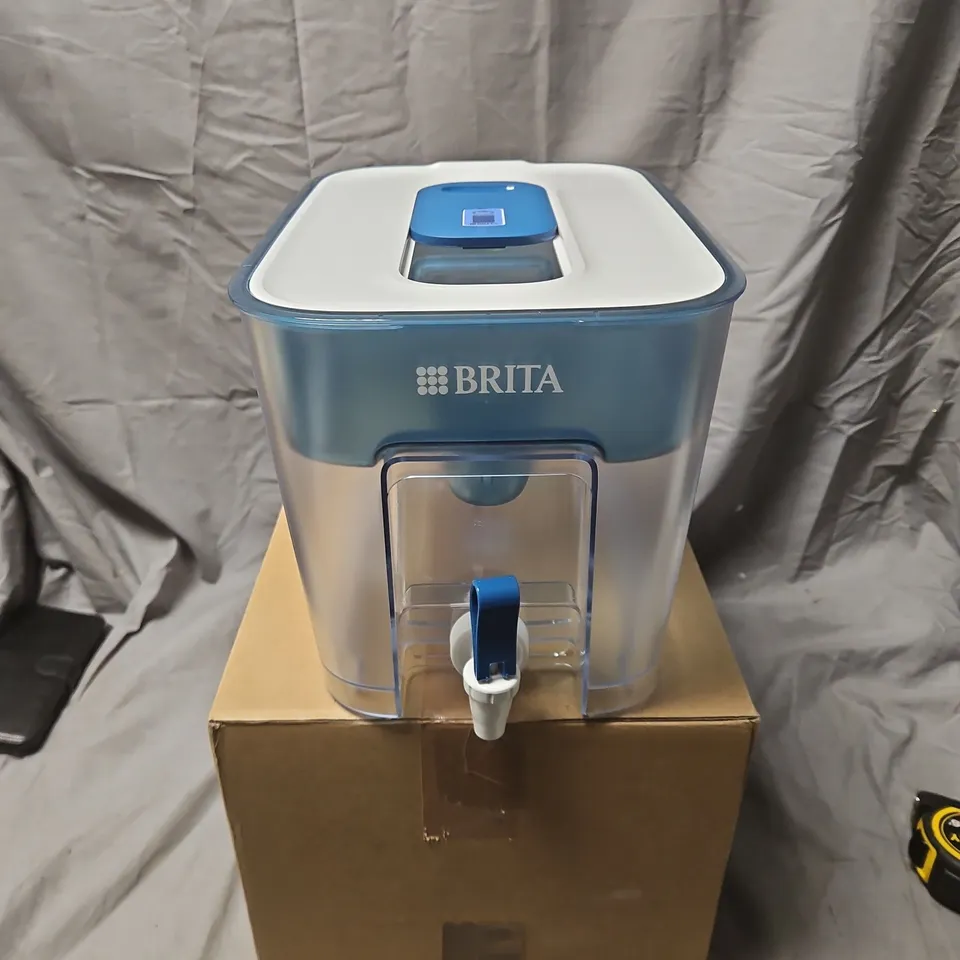 BRITA WATER FILTER JUG WITH BLUE LID AND POUR TAP
