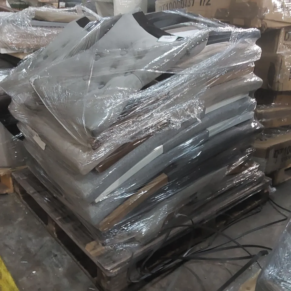 PALLET CONTAINING A LARGE QUANTITY OF DESIGNER CHAIR BACKS