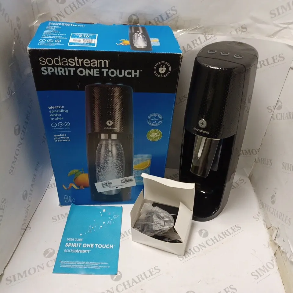 BOXED SODASTREAM SPIRIT ONE TOUCH ELECTRIC SPARKLING WATER MAKER, WITH POWER SUPPLY AND USER GUIDE
