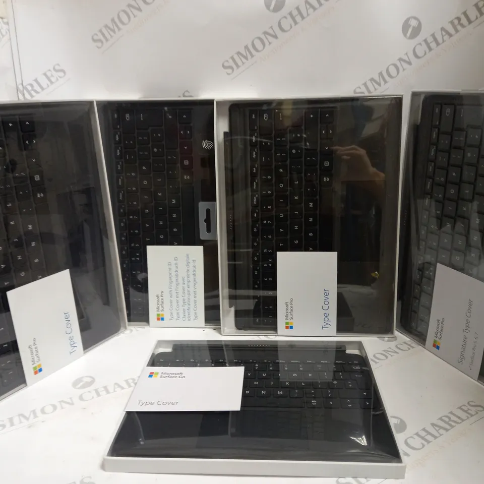 BOX OF APPROX 5 ASSORTED AND BOXED MICROSOFT SURFACE KEYBOARD ATTACHMENT.
