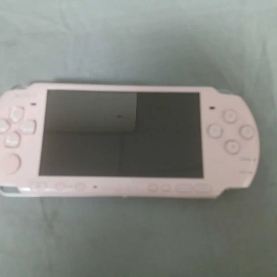 SONY PSP PORTABLE GAMING CONSOLE (PINK/WHITE) – UMD DRIVE