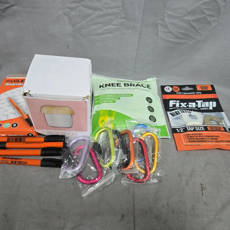 APPROXIMATELY 10 ASSORTED HOUSEHOLD ITEMS TO INCLUDE FIX-A-TAP, KNEE BRACE AND PENS