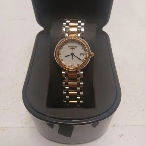 LONGINES TWO-TONE WRISTWATCH WITH DIAMOND-SET BEZEL