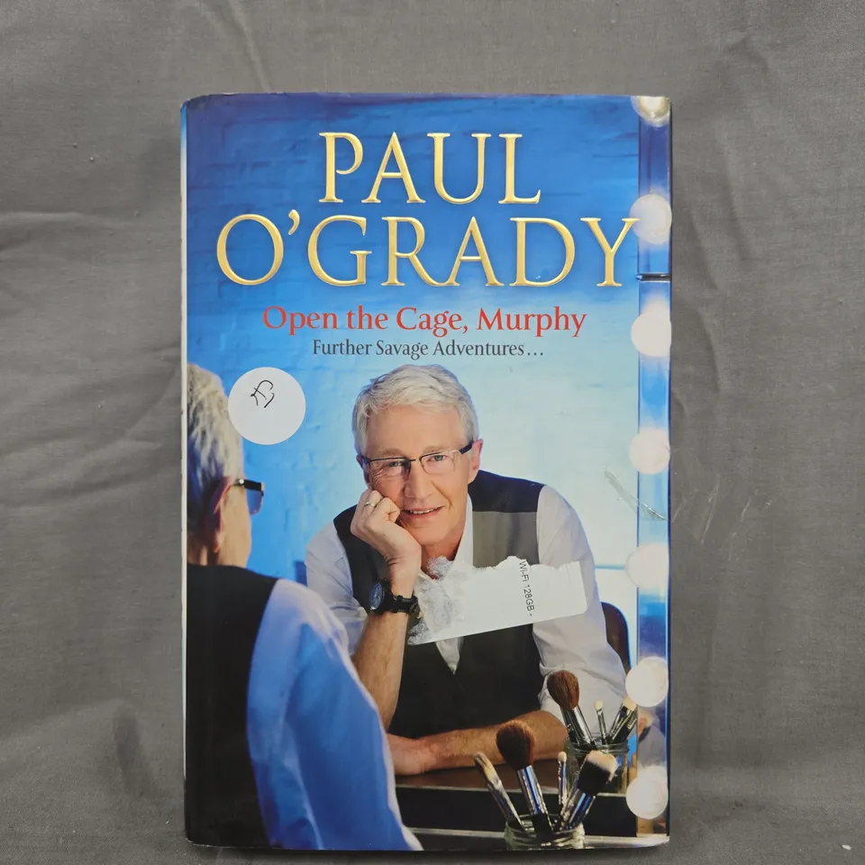 BOX OF APPROXIMATELY 10 ASSORTED HOUSEHOLD ITEMS TO INCLUDE PAUL O'GRADY BOOK, ETC - COLLECTION ONLY