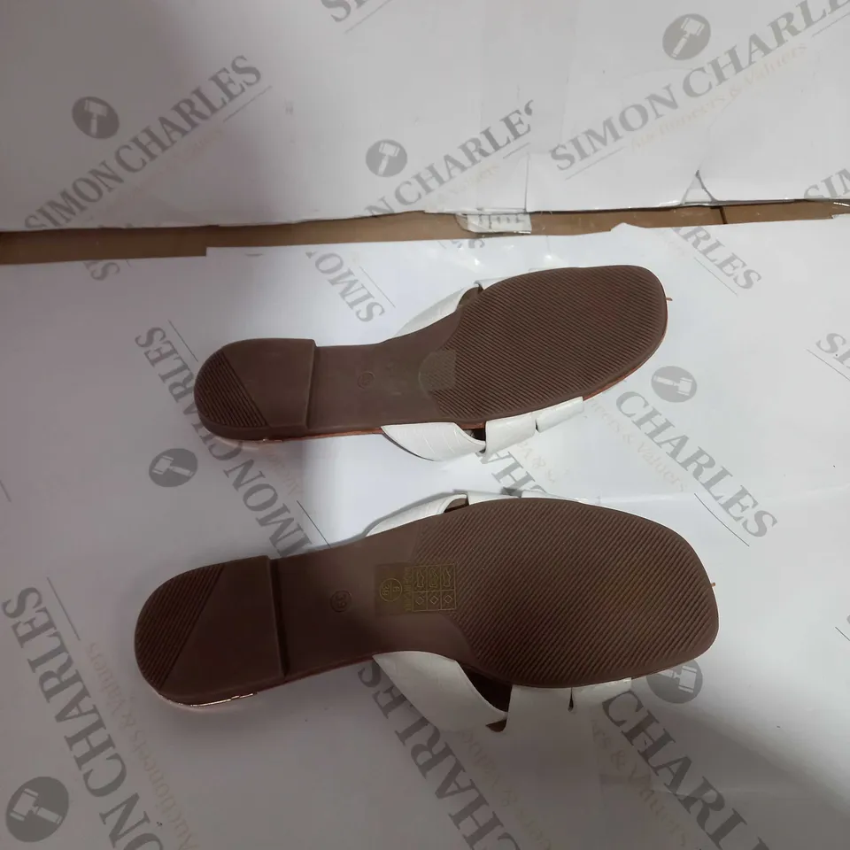 BOXED PAIR OF PRETTY LITTLE THINGS WHITE FLAT SANDALS 