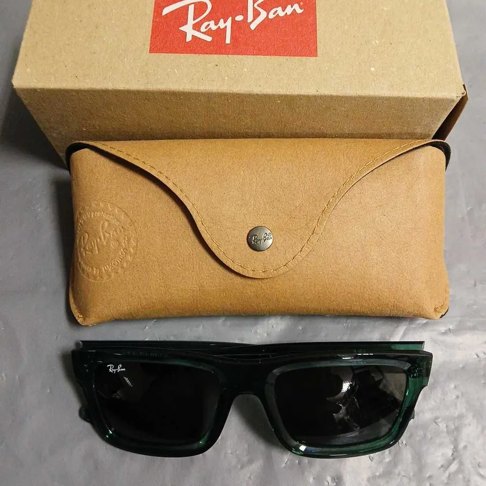 BOXED PAIR OF RAYBAN CLEAR GREEN FRAMED GLASSES