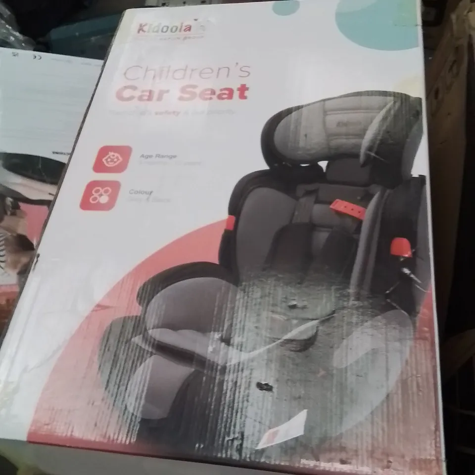 BOXED KIDOOLA CHILDREN'S CAR SEAT