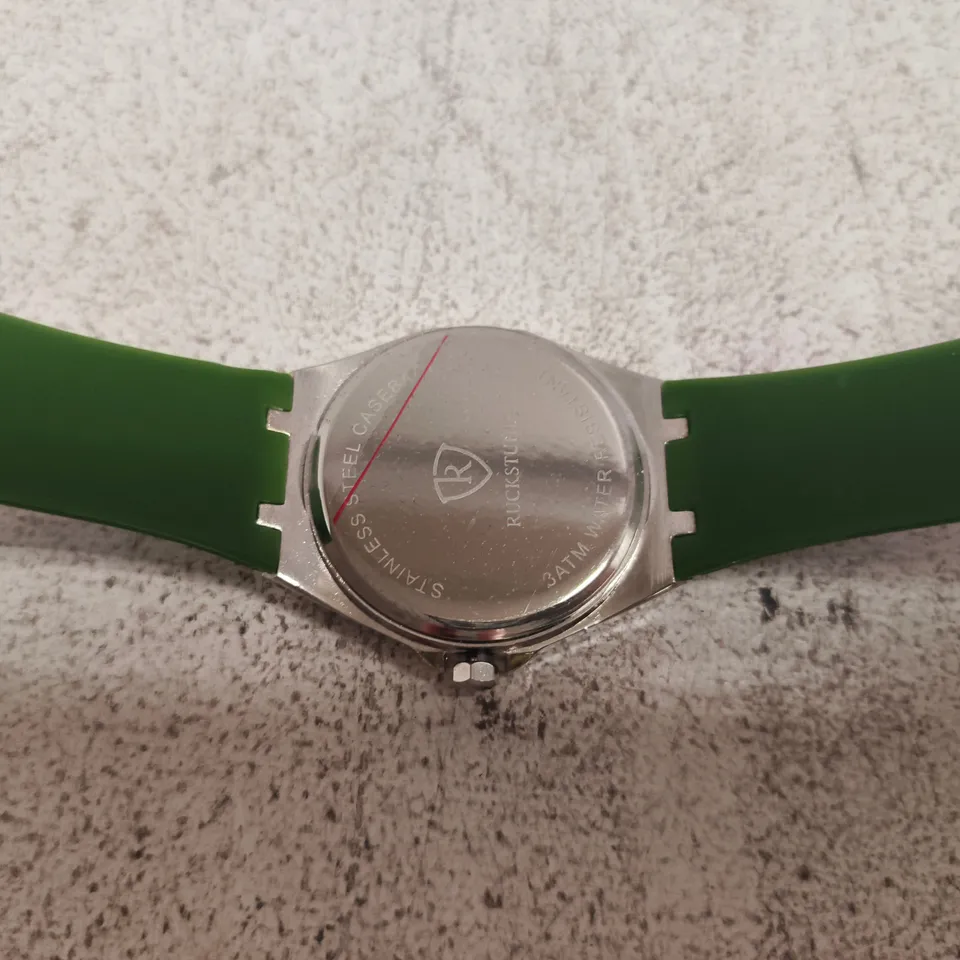 RUCKSTUHL STAINLESS STEEL WRISTWATCH WITH GREEN RUBBER STRAP – BOXED