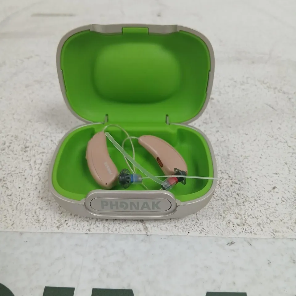 PHONAK HEARING AIDS WITH CASE (TWO BEIGE BTE DEVICES)