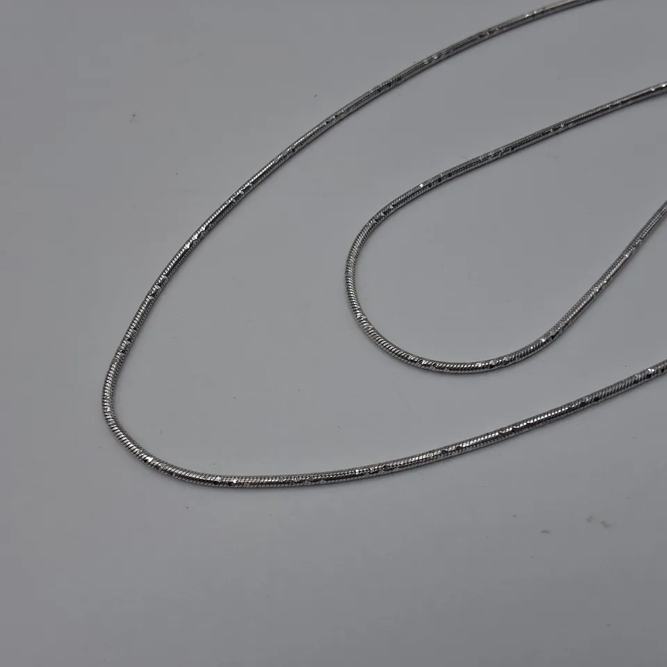 18CT WHITE GOLD HEART PENDANT ON CHAIN SET WITH NATURAL DIAMOND 