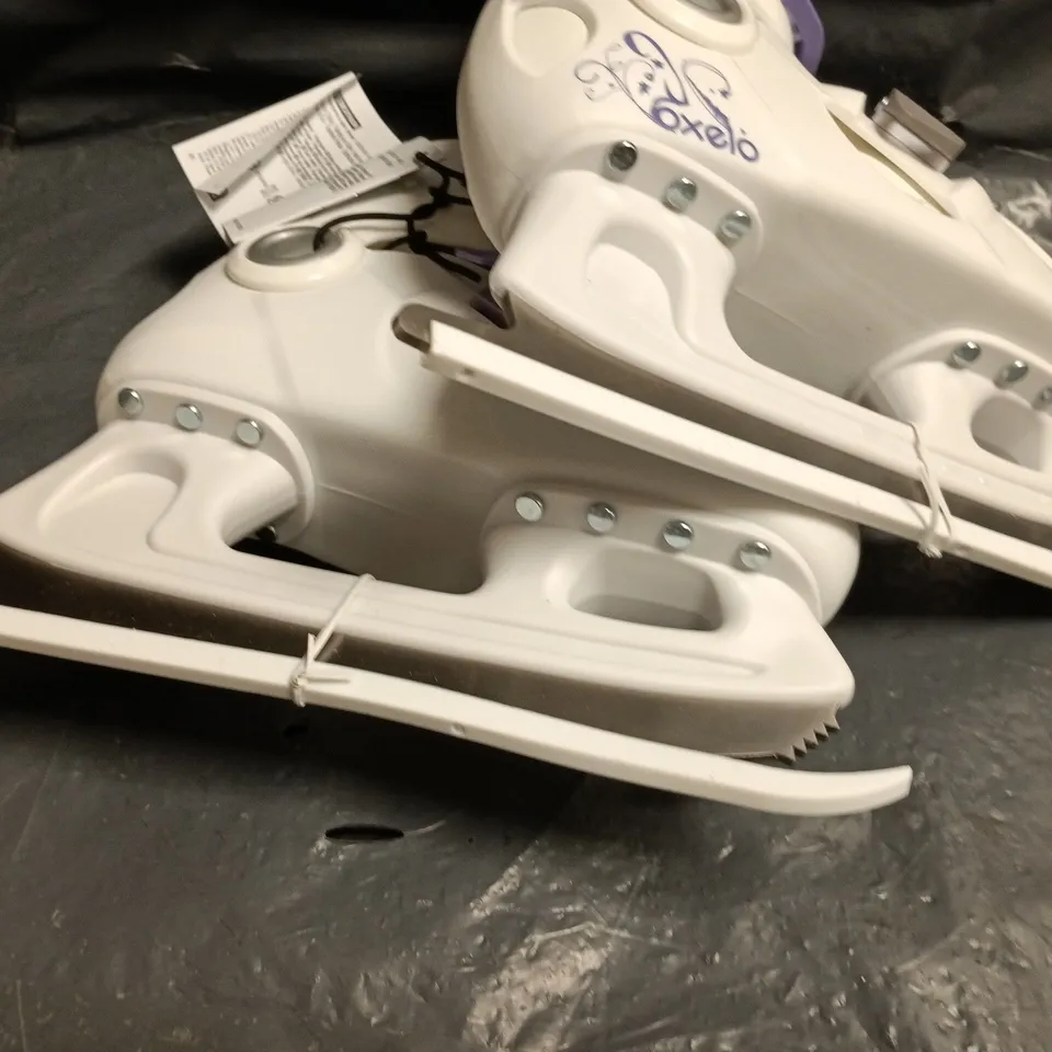 UNBOXED PAIR OD OXELO ICE SKATING BOOTS IN WHITE/PURPLE - UK 11.5C - 13C
