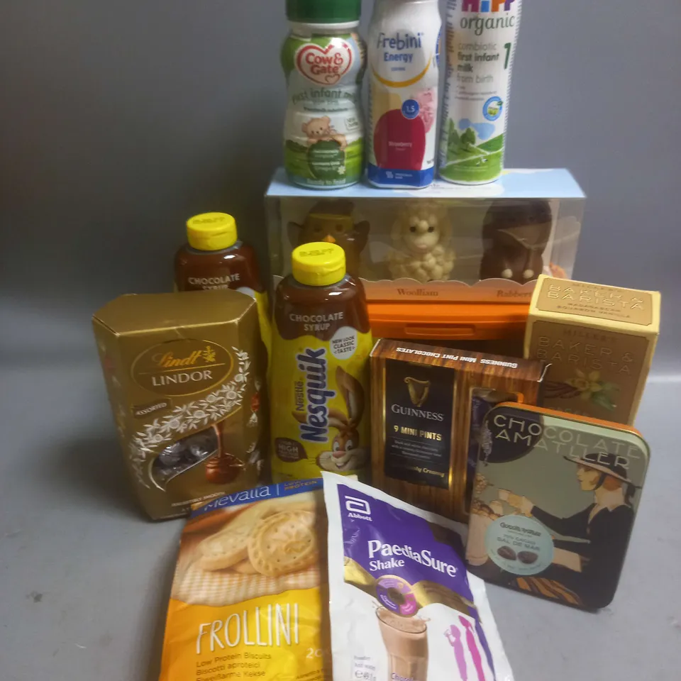 TOTE OF APPROX 10 ASSORTED FOOD ITEMS TO INCLUDE - LINDT SELECTION - NESQUIK CHOCOLATE SYRUP - NESCAFE AZERA AMERICANO 500G ETC