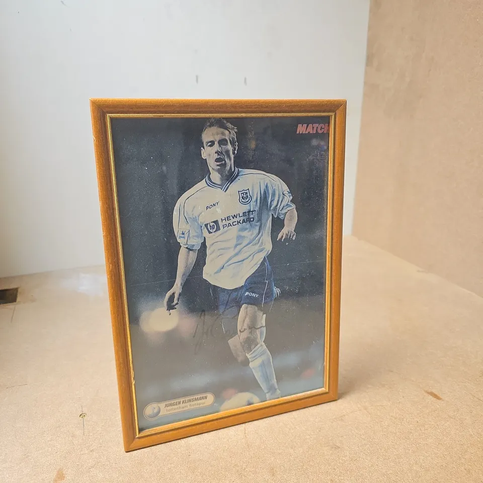JÜRGEN KLINSMANN FRAMED FOOTBALL PHOTOGRAPH – SIGNED