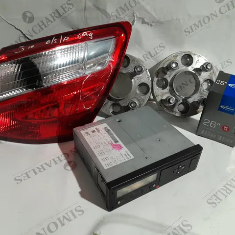 APPROXIMATELY 20 ASSORTED ITEMS TO INCLUDE WHEEL SPACER ADAPTER, NISSAN REAR LIGHT COMPONENT, TACHOGRAPH, SCHWALBE 26 INCH BICYCLE TUBE ETC.