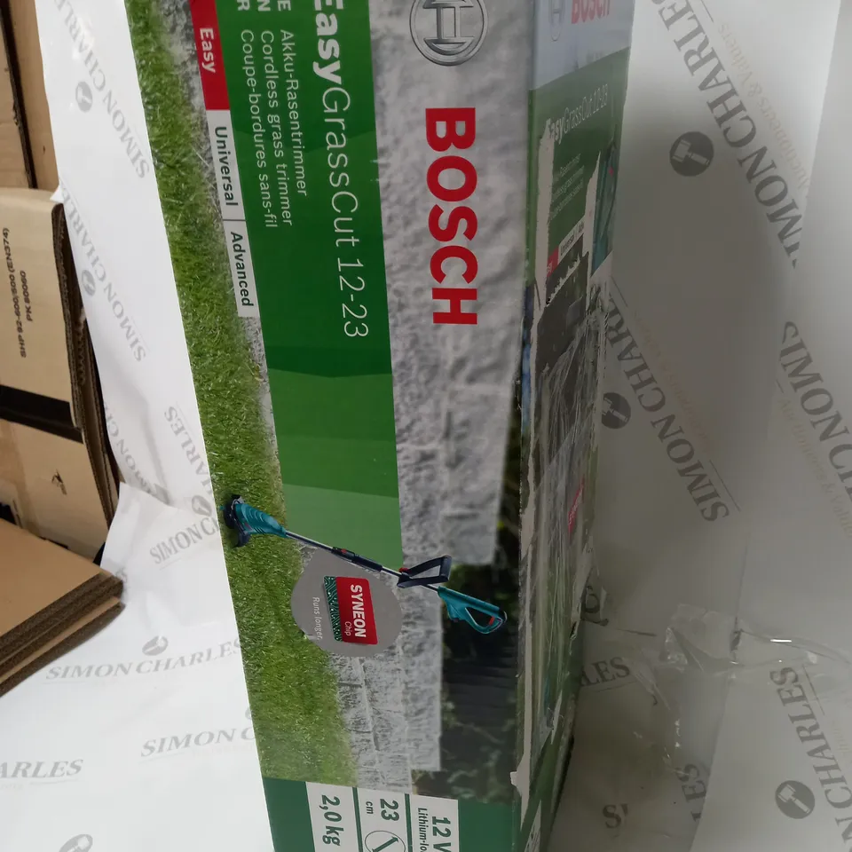 BOXED BOSCH CORDLESS EASY GRASS CUT 12-23 