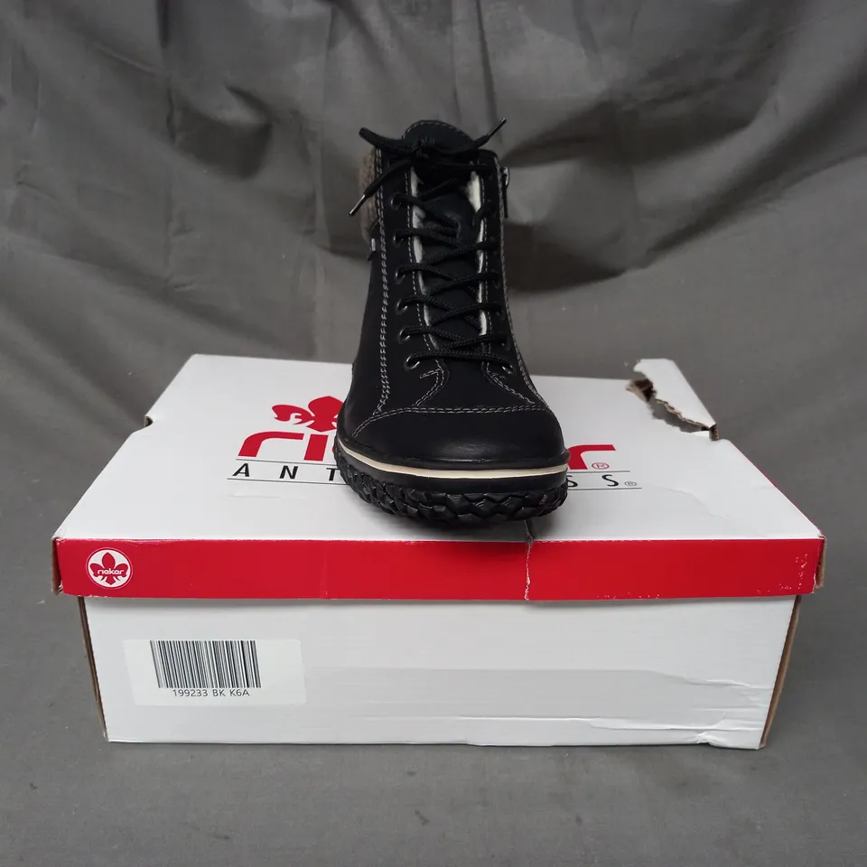 BOXED PAIR OF RIEKER WATER RESISTANT BOOTS IN BLACK SIZE 6.5