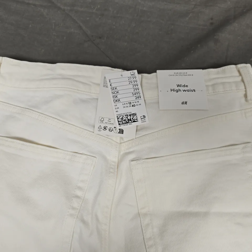 H&M WIDE HIGH WAIST JEANS IN WHITE - UK 12