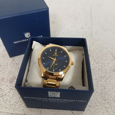 MONTRES PRESTIGE WRISTWATCH – GOLD TONE WITH BLUE DIAL, BOXED