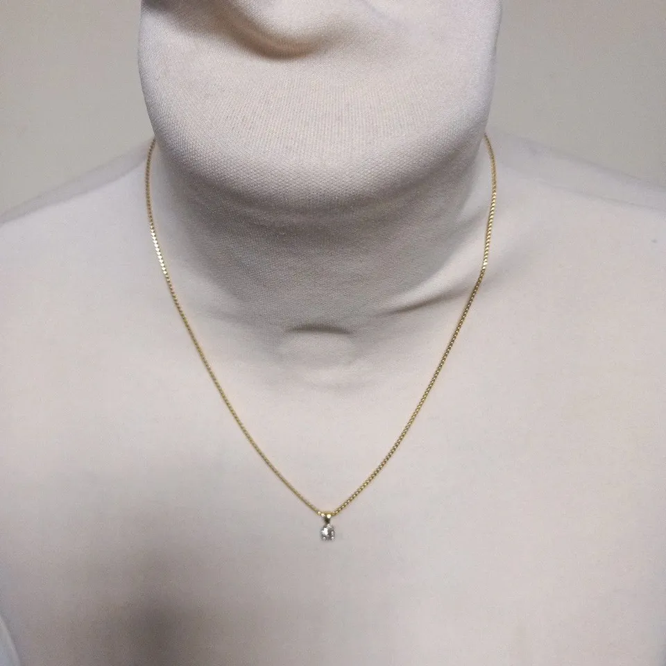 18CT GOLD DIAMOND SET PENDANT ON CHAIN