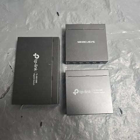LOT OF 3 ASSORTED UNBOXED GIGABIT SWITCHES INCLUDES TP-LINK TL-SG108E AND TP-LINK TL-SG105E