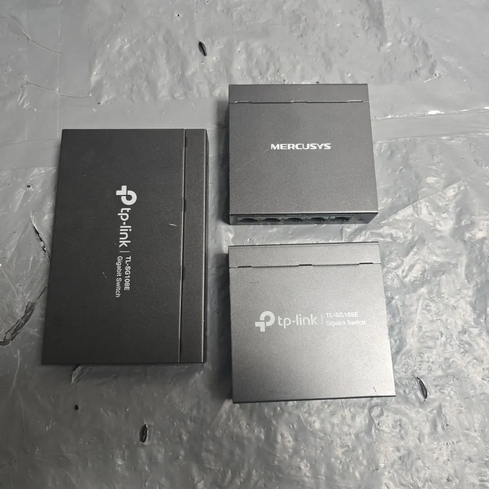 LOT OF 3 ASSORTED UNBOXED GIGABIT SWITCHES INCLUDES TP-LINK TL-SG108E AND TP-LINK TL-SG105E
