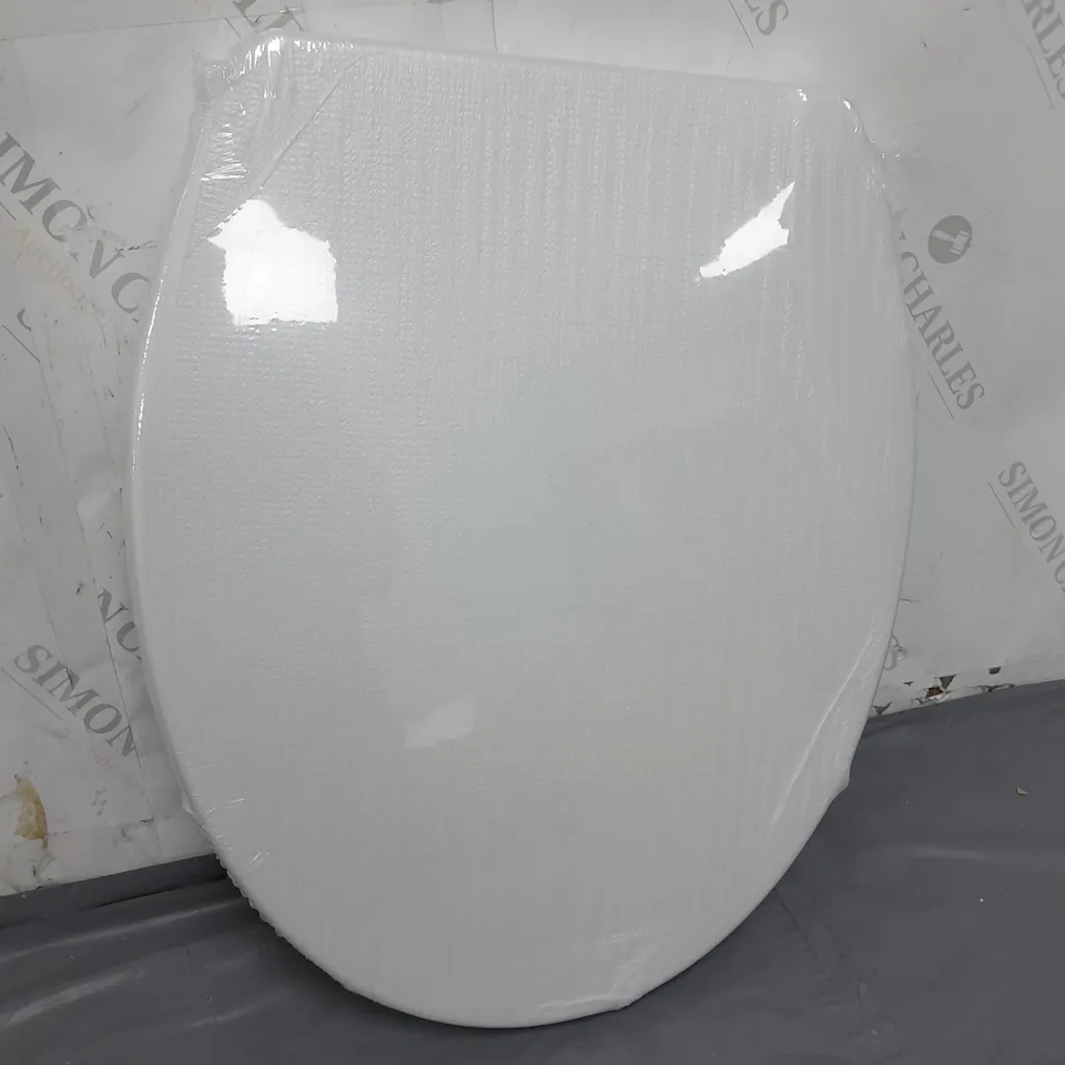 BOXED AND SEALED TOILET SEAT 
