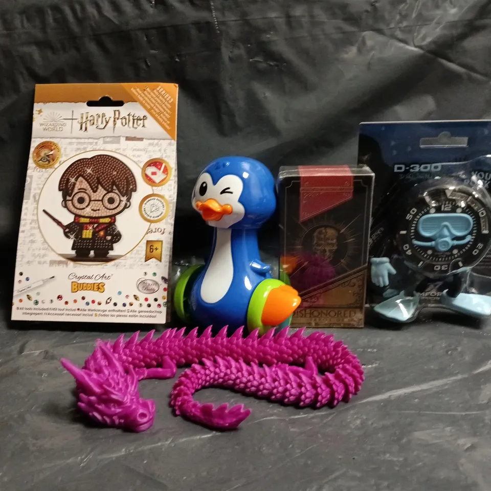 APPROXIMATELY 10 ASSORTED TOYS AND GAMES TO INCLUDE HARRY POTTER CRYSTAL ART BUDDIES, DISHONORED TAROT DECK, ETC