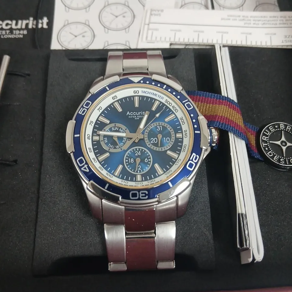 ACCURIST CHRONOGRAPH WATCH WITH BLUE DIAL, TACHYMETER BEZEL, IN BOX (INCLUDES EXTRA STRAP)