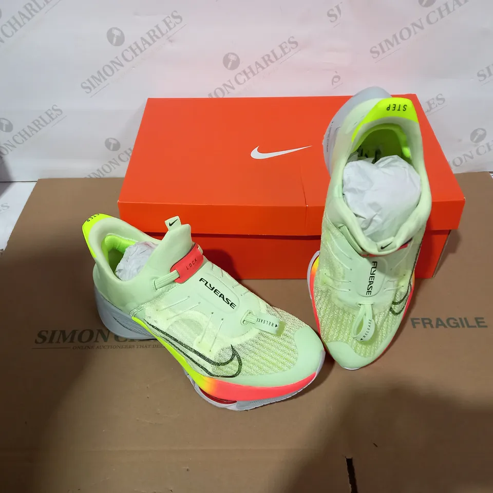 BOXED PAIR OF NIKE MULTICOLOURED TRAINERS SIZE 10