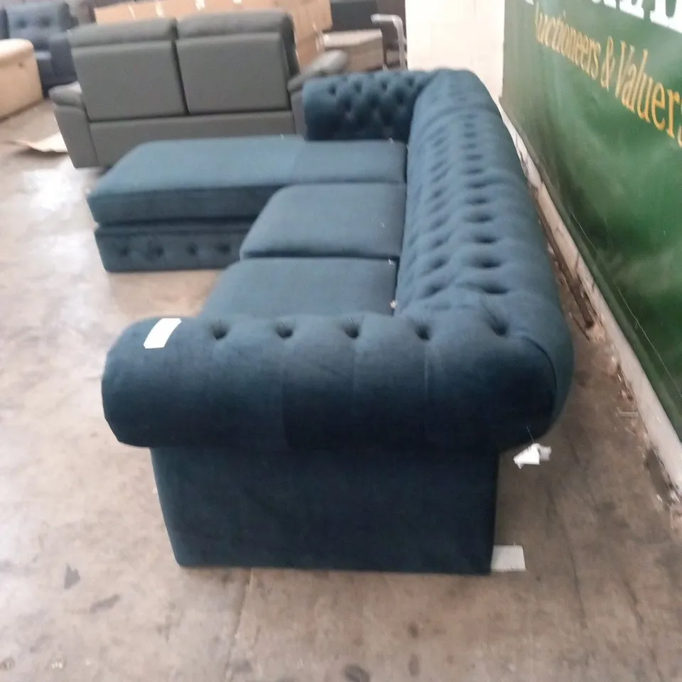 DESIGNER MIDNIGHT BLUE FABRIC BUTTON BACK LARGE CORNER SOFA WITH SCROLL ARM DETAIL